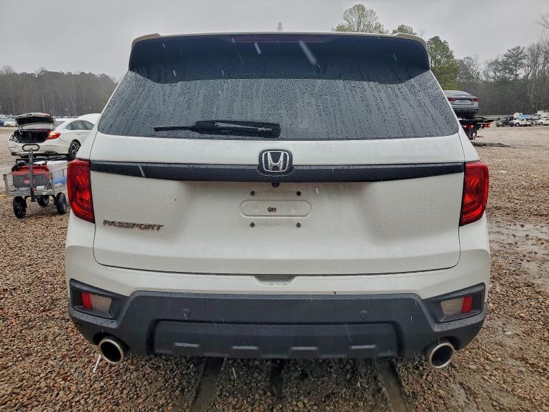 Photo 6 from auction – 2022 HONDA PASSPORT with VIN 5FNYF7H56NB000832