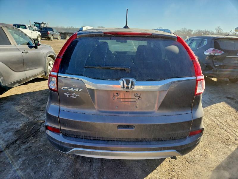 Photo 6 from auction – 2015 HONDA CR-V EXL with VIN 5J6RM3H77FL004790