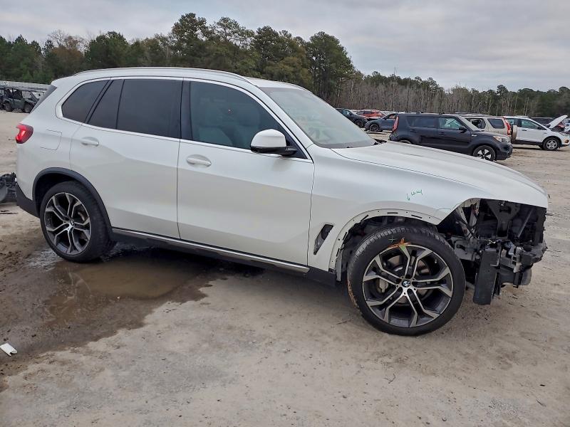 Photo 4 from auction – 2023 BMW X5 XDRIVE4 with VIN 5UXCR6C04P9P63290