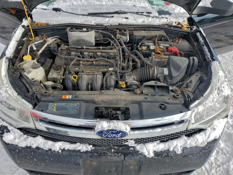 Photo 11 from auction – 2011 FORD FOCUS S with VIN 1FAHP3ENXBW109818