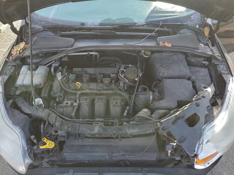 Photo 11 from auction – 2014 FORD FOCUS SE with VIN 1FADP3F2XEL355910