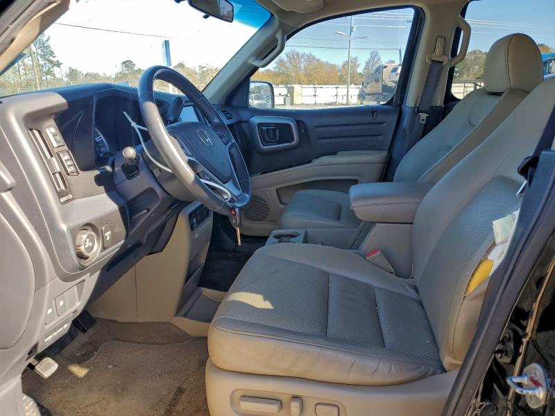 Photo 7 from auction – 2010 HONDA RIDGELINE with VIN 5FPYK1F58AB013613