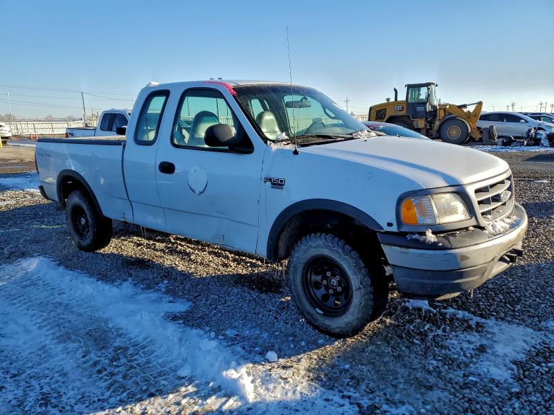 Photo 4 from auction – 2000 FORD F150 with VIN 1FTRX18W8YNB75984