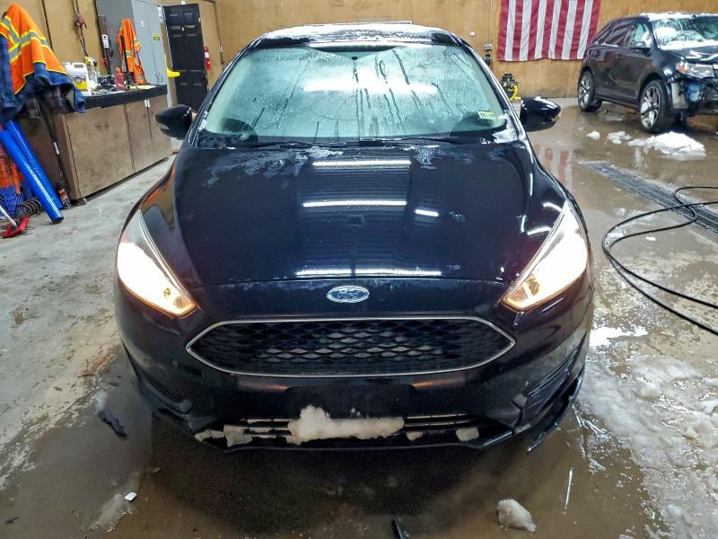 Photo 5 from auction – 2016 FORD FOCUS SE with VIN 1FADP3F25GL357132