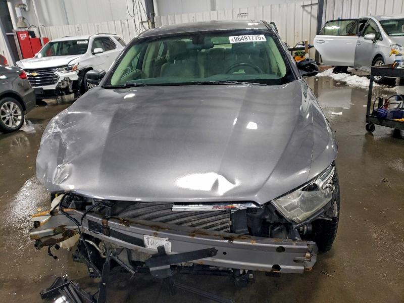 Photo 5 from auction – 2014 FORD TAURUS SE with VIN 1FAHP2D89EG143317