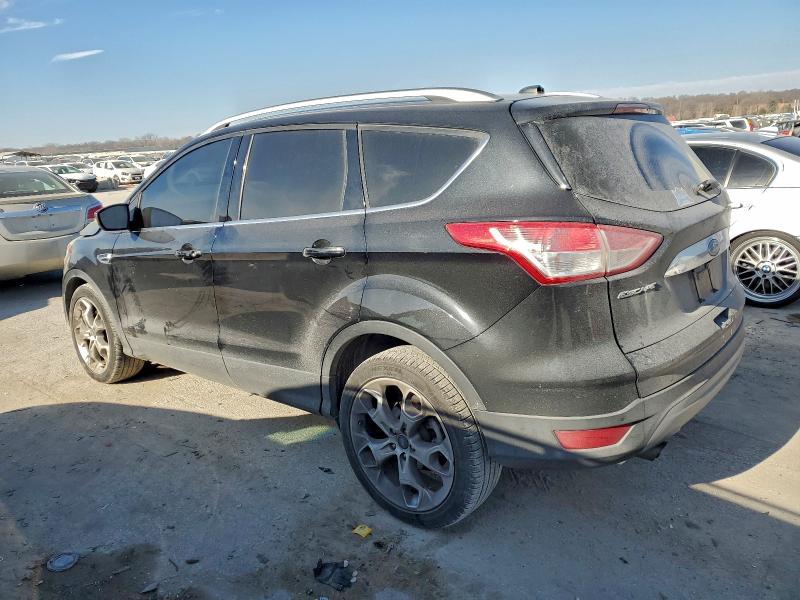 Foto 2 de la subasta – 2014 FORD ESCAPE TIT con VIN 1FMCU0J97EUA35077