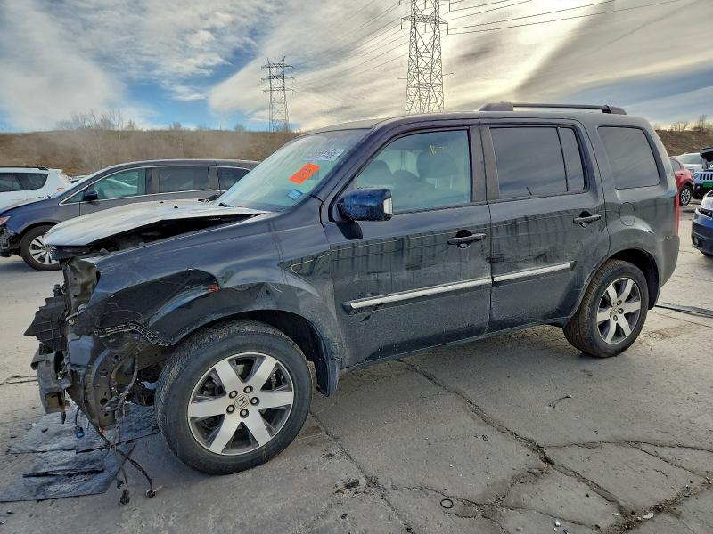 HONDA PILOT TOUR 2013 with VIN 5FNYF4H97DB020040 - Photo from auction