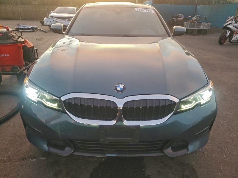 Photo 5 from auction – 2021 BMW 330I with VIN 3MW5R1J05M8B58083