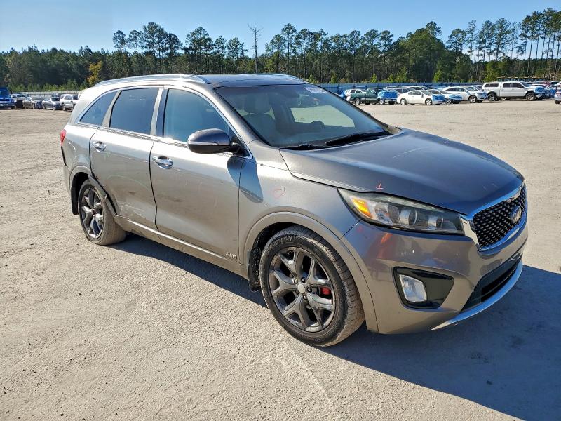 Photo 4 from auction – 2016 KIA SORENTO SX with VIN 5XYPKDA53GG090453