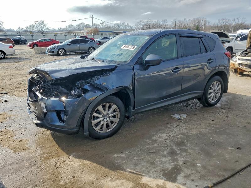 MAZDA CX-5 TOURI 2013 with VIN JM3KE4CE9D0111863 - Photo from auction