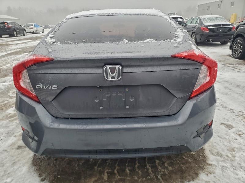 Photo 6 from auction – 2017 HONDA CIVIC LX with VIN 2HGFC2F50HH020855