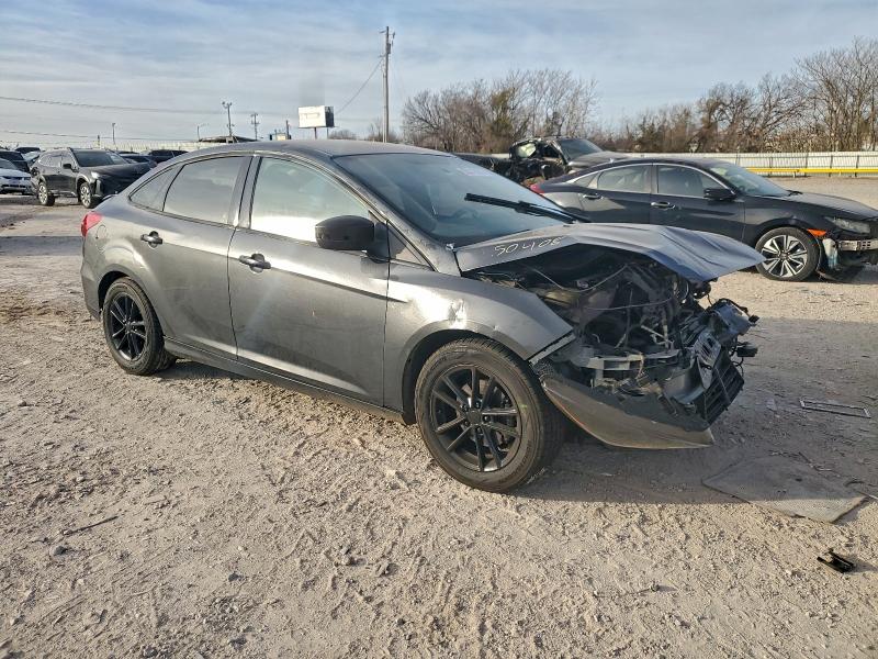 Photo 4 from auction – 2016 FORD FOCUS SE with VIN 1FADP3F2XGL352878