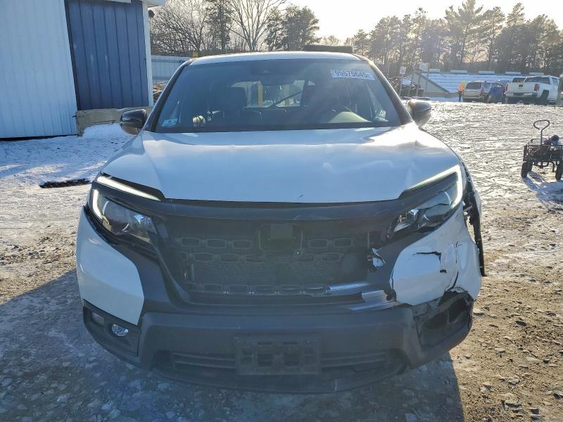 Photo 5 from auction – 2021 HONDA PASSPORT E with VIN 5FNYF8H58MB029835