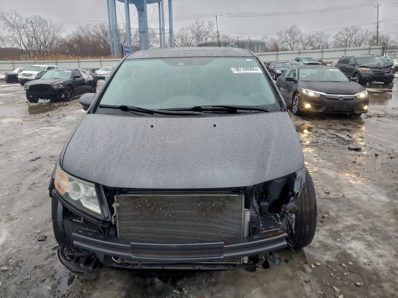 Photo 5 from auction – 2014 HONDA ODYSSEY EX with VIN 5FNRL5H60EB049650