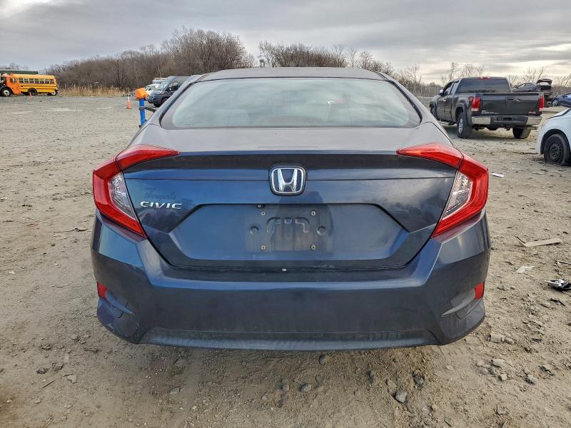 Photo 6 from auction – 2016 HONDA CIVIC LX with VIN 19XFC2F54GE026408