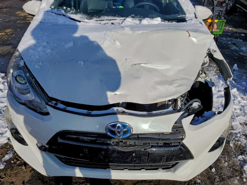 Photo 11 from auction – 2015 TOYOTA PRIUS C with VIN JTDKDTB34F1087667