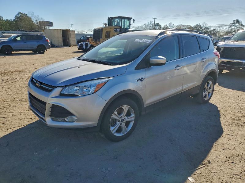 FORD ESCAPE SE 2016 with VIN 1FMCU9GX0GUC24747 - Photo from auction