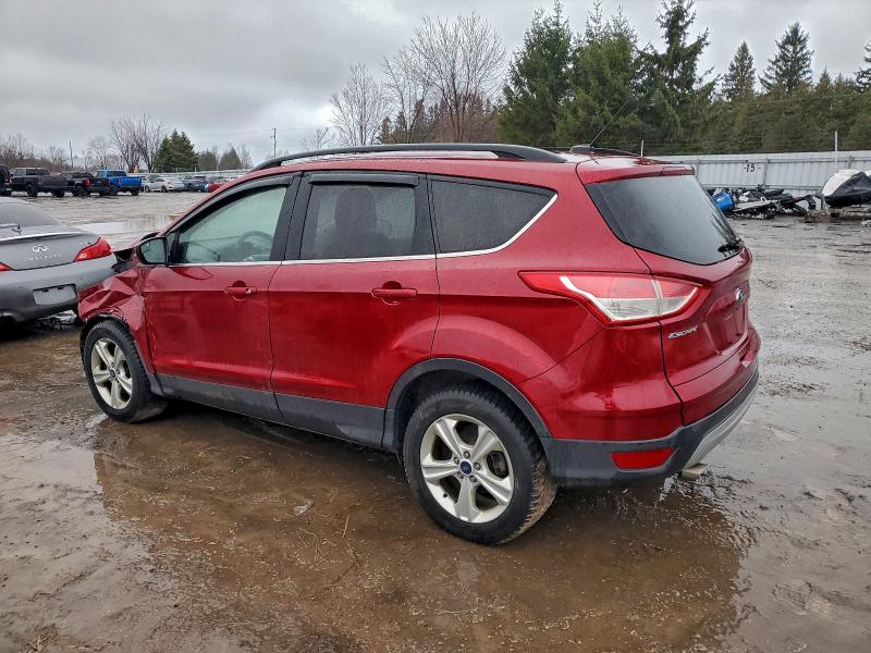 Photo 2 from auction – 2015 FORD ESCAPE SE with VIN 1FMCU9GX1FUB76674
