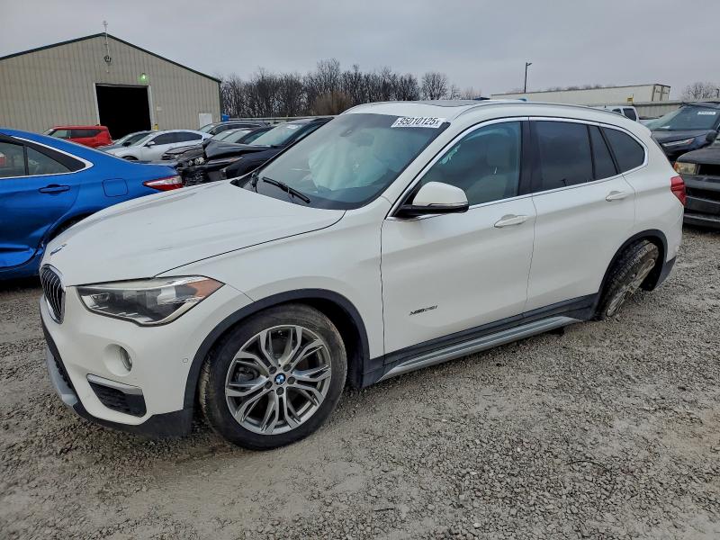BMW X1 2017 with VIN WBXHT3Z32H4A56265 - Photo from auction