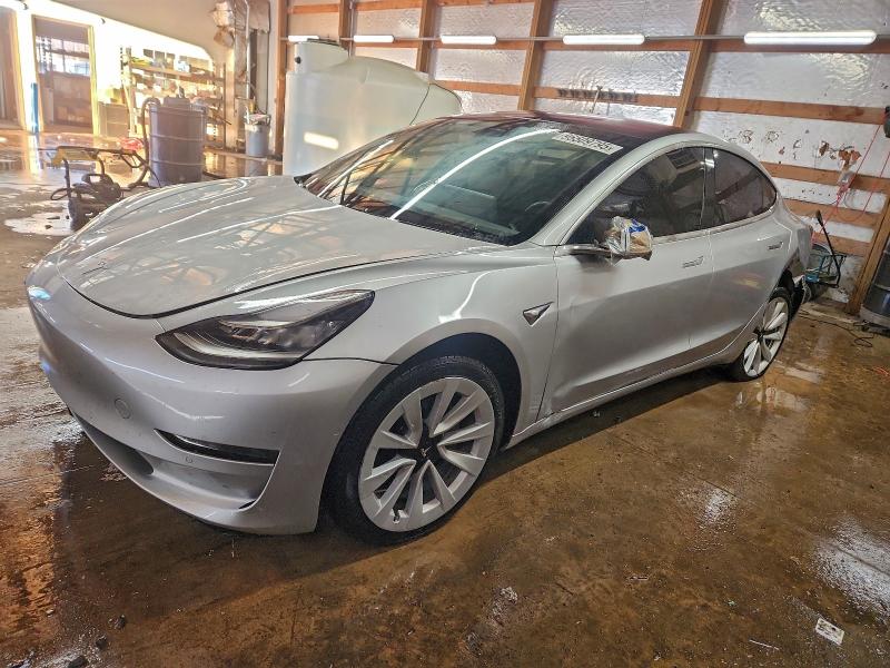 TESLA MODEL 3 2018 with VIN 5YJ3E1EB6JF087663 - Photo from auction