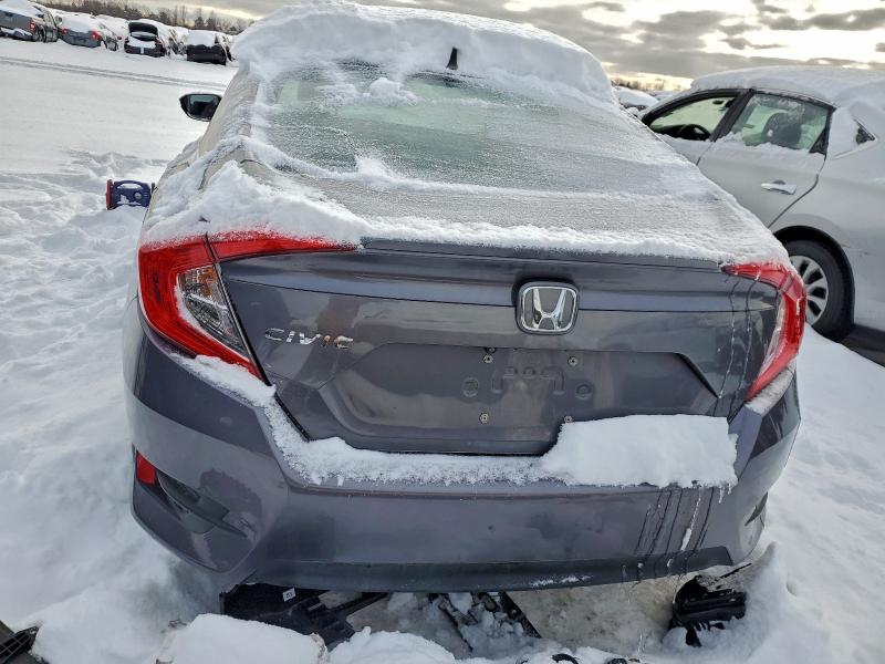 Photo 6 from auction – 2016 HONDA CIVIC with VIN 19XFC1F39GE041172