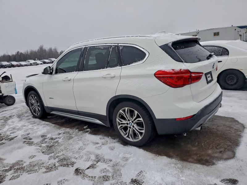 Photo 2 from auction – 2017 BMW X1 XDRIVE2 with VIN WBXHT3C3XH5F79617