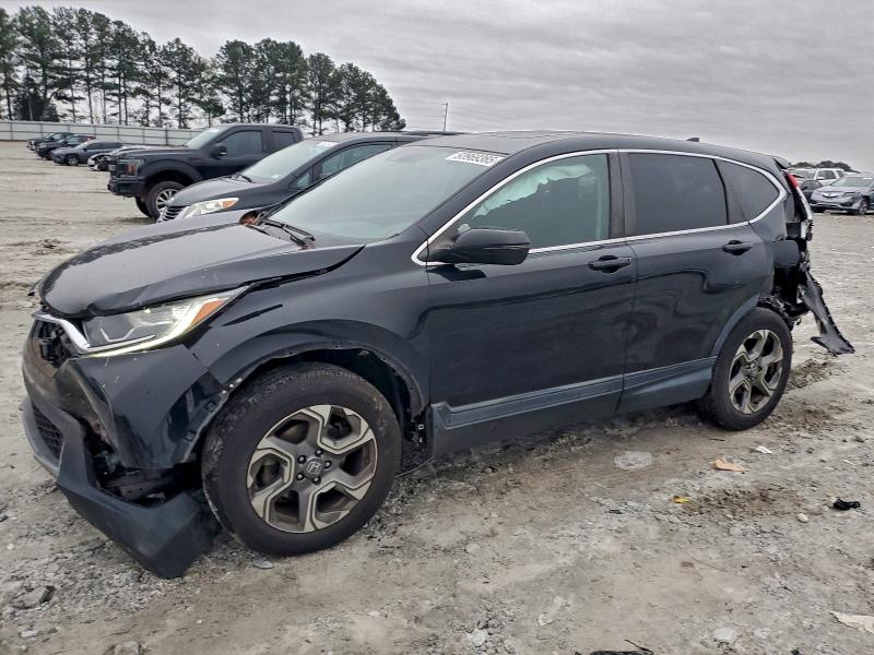 Photo 1 from auction – 2019 HONDA CR-V with VIN 2HKRW1H56KH513044
