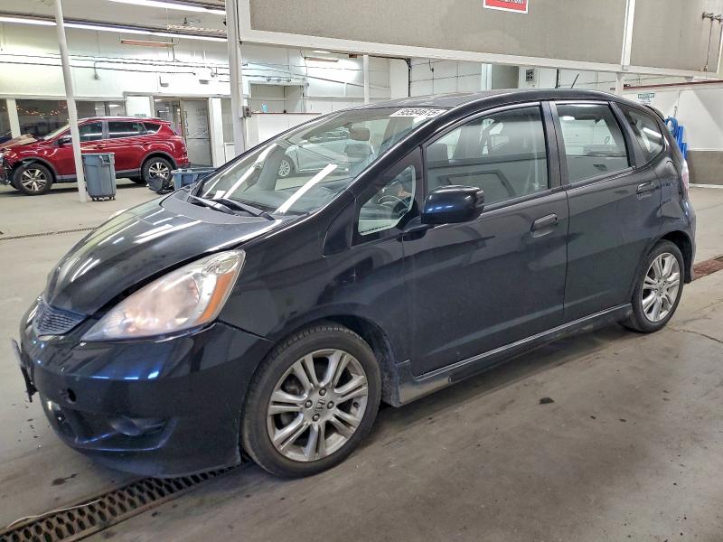 HONDA FIT 2010 with VIN JHMGE8H41AC034601 - Photo from auction