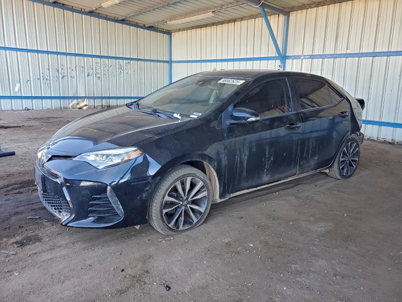 TOYOTA COROLLA L 2017 with VIN 5YFBURHE9HP679754 - Photo from auction