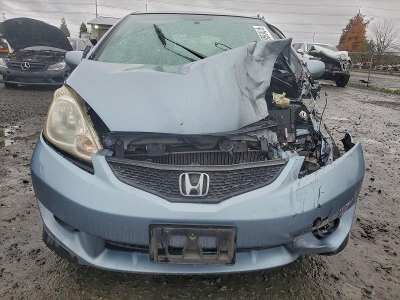 Photo 5 from auction – 2011 HONDA FIT SPORT with VIN JHMGE8H50BC006024