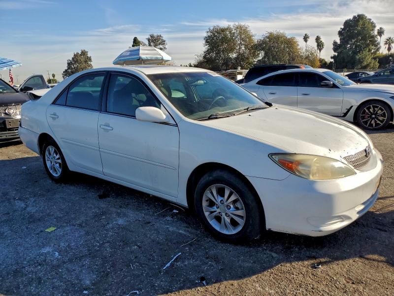 Photo 4 from auction – 2004 TOYOTA CAMRY LE with VIN 4T1BF32K84U072436