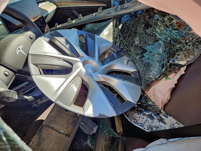 Photo 7 from auction – 2023 TESLA MODEL Y with VIN 7SAYGDEE8PF861970