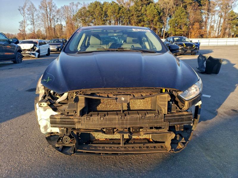 Photo 5 from auction – 2015 FORD FUSION S with VIN 3FA6P0G77FR273847