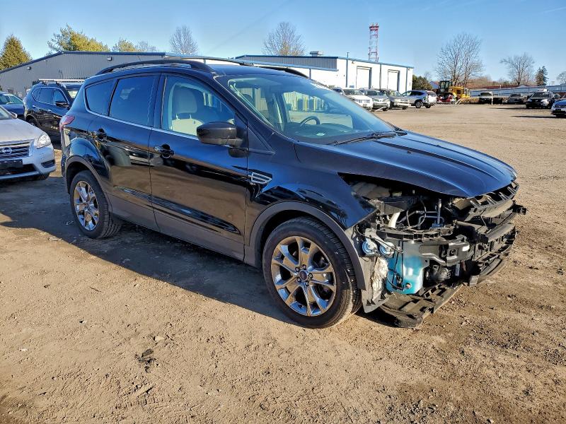 Photo 4 from auction – 2016 FORD ESCAPE SE with VIN 1FMCU9G9XGUA81484