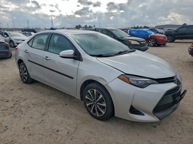 Photo 4 from auction – 2017 TOYOTA COROLLA L with VIN 5YFBURHE7HP695869