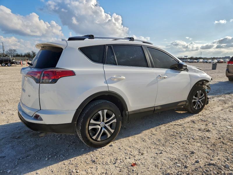 Photo 3 from auction – 2017 TOYOTA RAV4 LE with VIN JTMZFREV6HJ700156