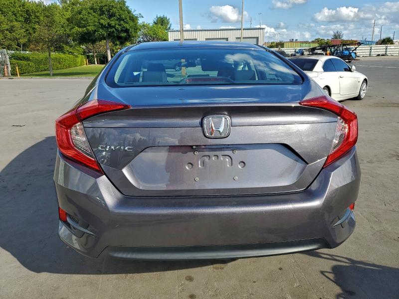 Photo 6 from auction – 2017 HONDA CIVIC LX with VIN 19XFC2F57HE050333