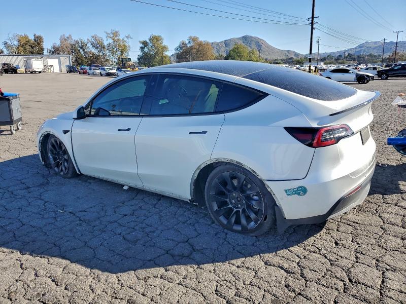 Photo 2 from auction – 2021 TESLA MODEL Y with VIN 5YJYGAEE0MF270667