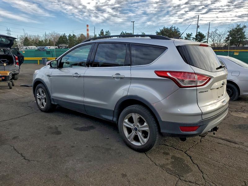 Photo 2 from auction – 2016 FORD ESCAPE SE with VIN 1FMCU0GX5GUC33701