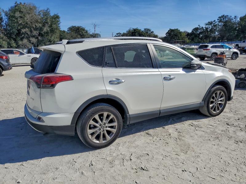 Photo 3 from auction – 2016 TOYOTA RAV4 LIMIT with VIN JTMYFREV7GJ066091
