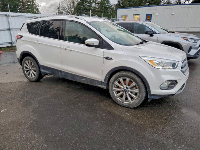 Photo 4 from auction – 2017 FORD ESCAPE TIT with VIN 1FMCU0J94HUB46142
