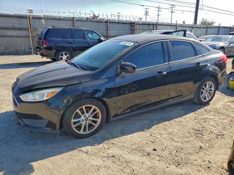 FORD FOCUS SE 2018 with VIN 1FADP3F25JL315874 - Photo from auction