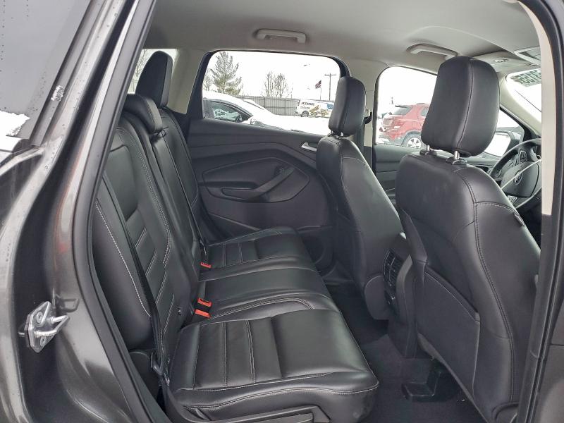 Photo 11 from auction – 2018 FORD ESCAPE TIT with VIN 1FMCU9J94JUC33646