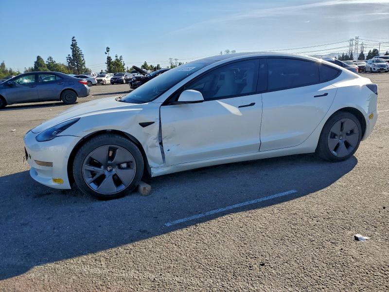TESLA MODEL 3 2022 with VIN 5YJ3E1EB5NF195648 - Photo from auction