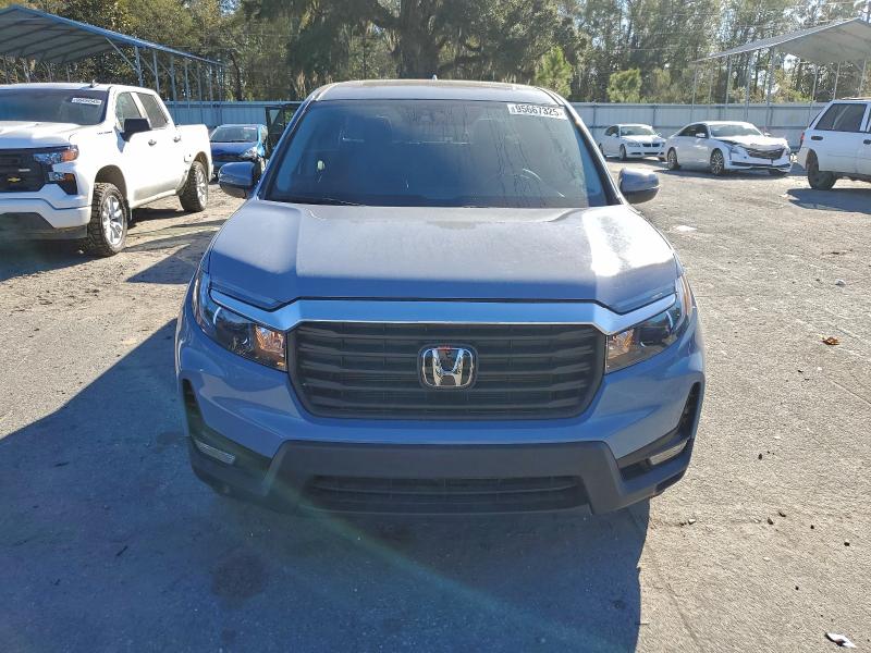 Photo 5 from auction – 2023 HONDA RIDGELINE with VIN 5FPYK3F57PB027538