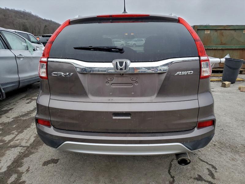 Photo 6 from auction – 2016 HONDA CR-V EXL with VIN 2HKRM4H79GH630178