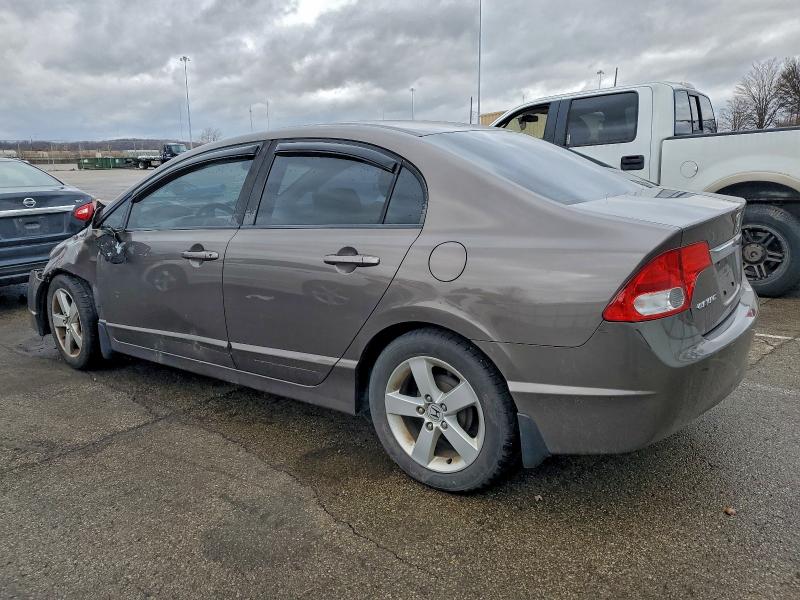 Photo 2 from auction – 2011 HONDA CIVIC LX with VIN 19XFA1F57BE019865