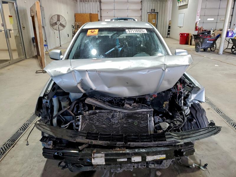 Photo 5 from auction – 2007 KIA RIO BASE with VIN KNADE123576261385