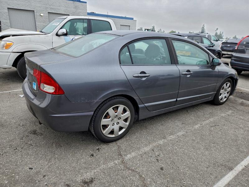 Photo 3 from auction – 2010 HONDA CIVIC LX with VIN 19XFA1F56AE068571