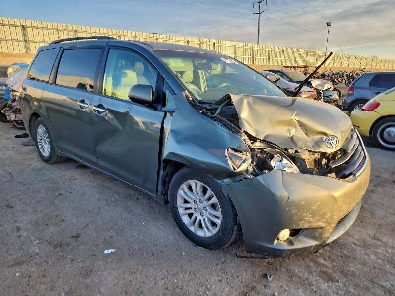 Photo 4 from auction – 2014 TOYOTA SIENNA XLE with VIN 5TDYK3DC1ES435262